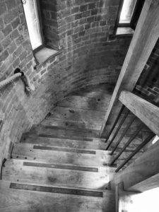 staircase with bannisters
